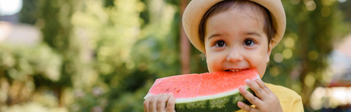Child eating watermelon