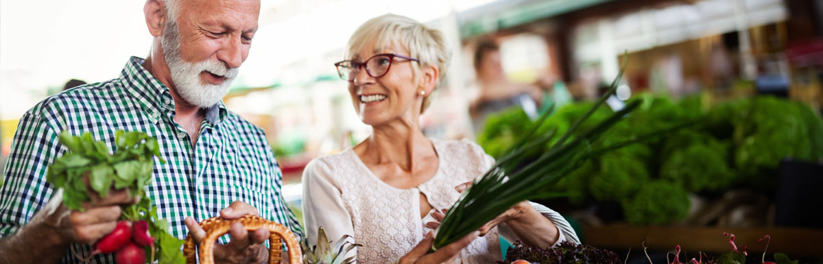 People buying food at markets