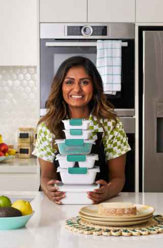 Woman showcasing a set of 6 food storage containers