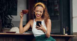 lady drinking coffee on phone