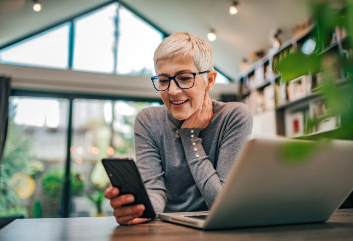 Suncorp Bank Self Managed Super Fund – woman using mobile phone