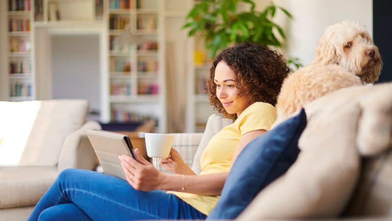 Woman looking at Ipad (Desktop Version)