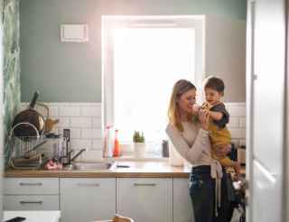 Mum and child in new house