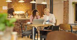 two women in business talks