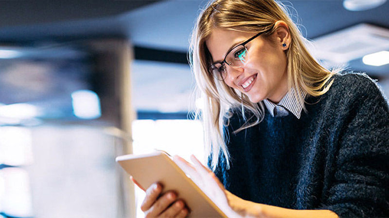 Please share your suggestions, compliments and complaints - Woman on an iPad