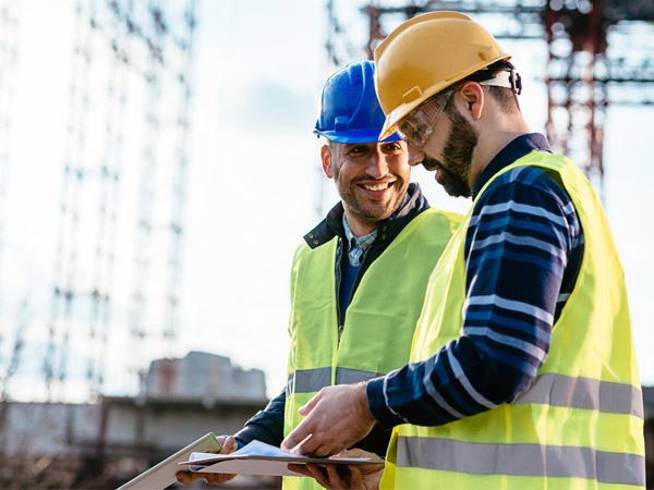 Two construction workers