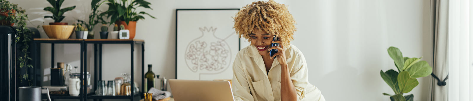 Woman on phone writing