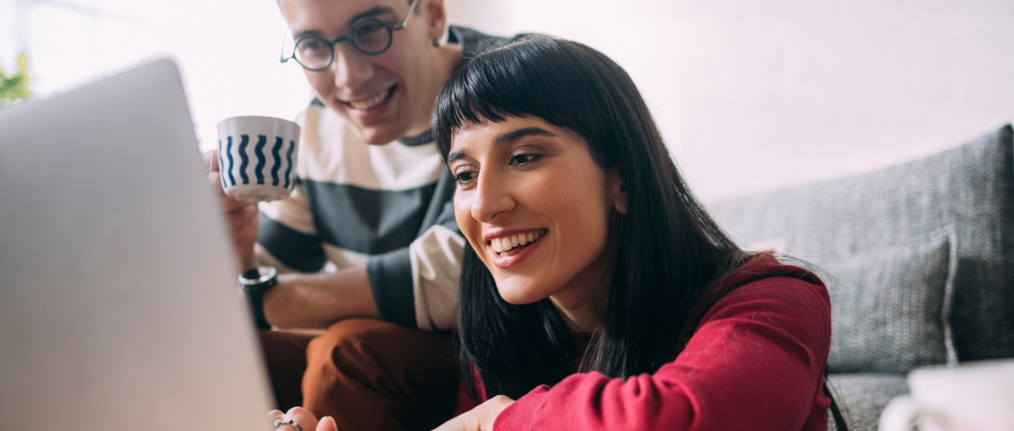 Couple using laptop