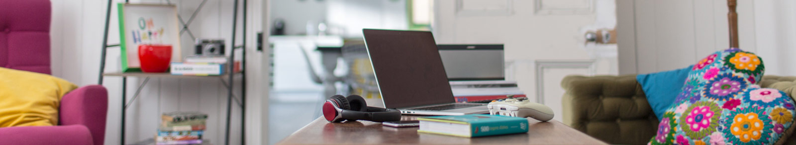 A laptop & book on study table