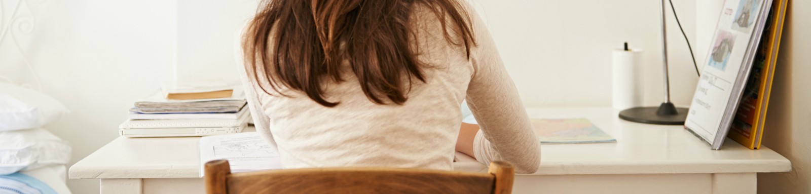 Girl sitting at desk