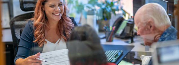 woman serving two customers