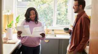 Couple looking at documents