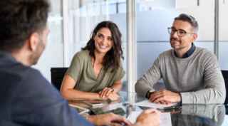 Couple meeting with a home loan expert