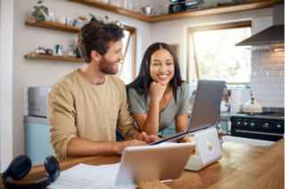 couple looking at laptop