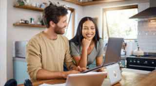 couple looking at the screen